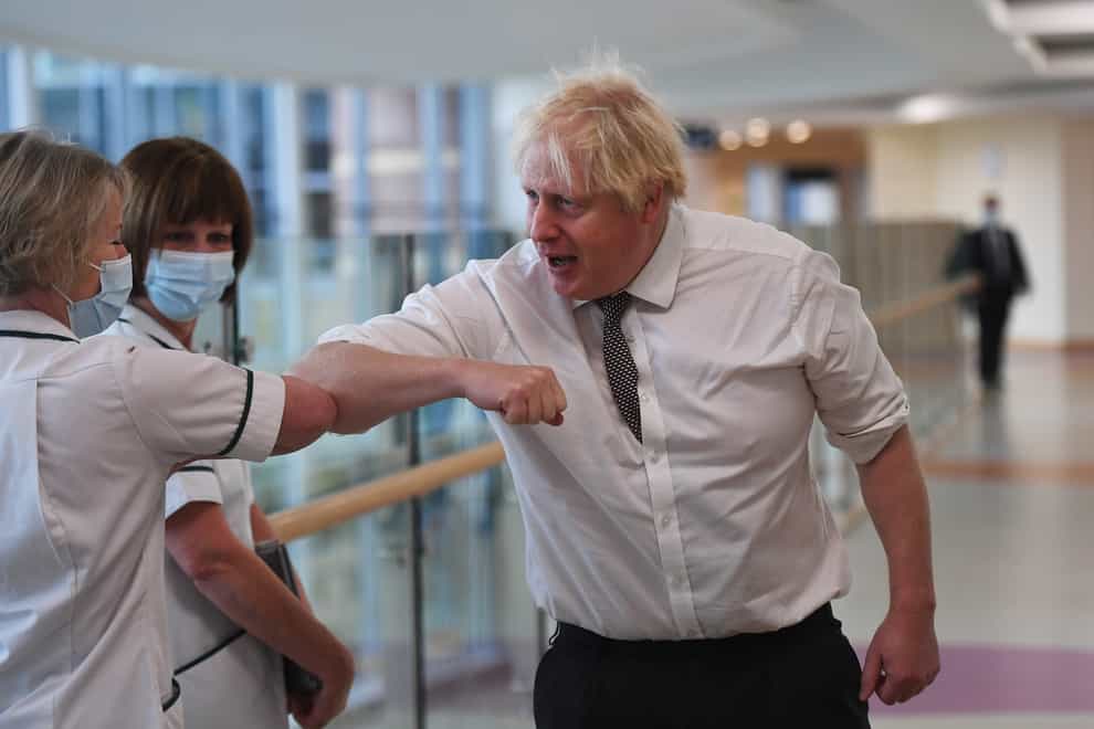 Prime Minister Boris Johnson has been criticised for not wearing a face covering at all times during his visit to Hexham General Hospital (Peter Summers/PA)