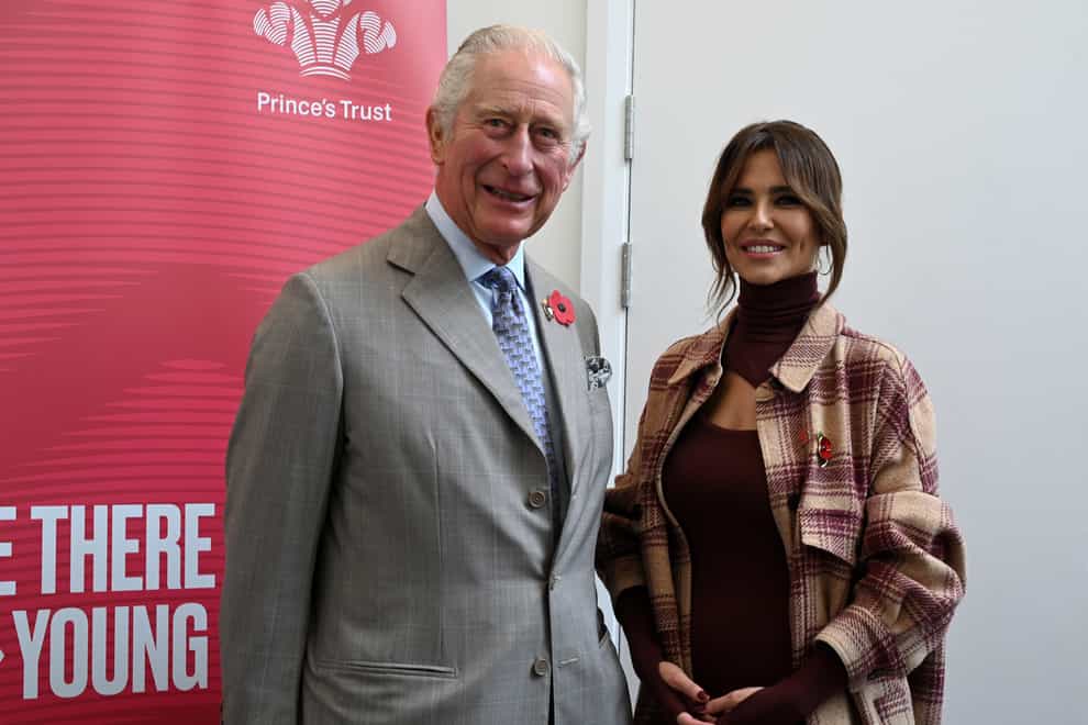 The Prince of Wales chats with Cheryl (Oli Scarff/PA)