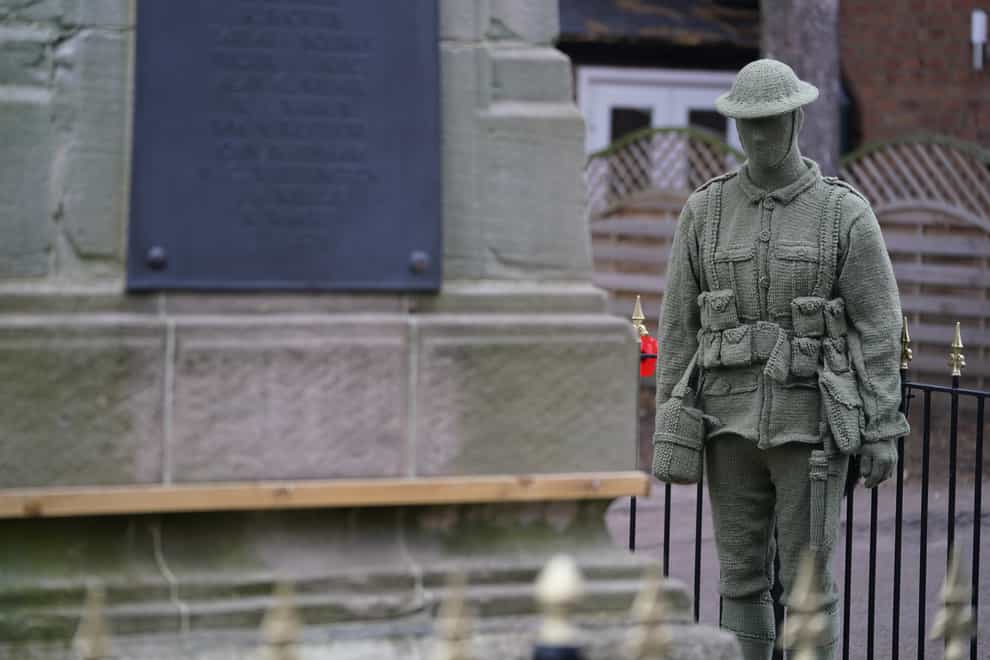 A life-sized knitted soldier (Mike Egerton/PA)