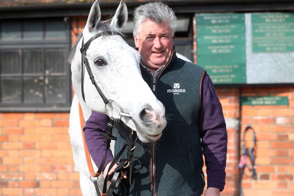 Trainer Paul Nicholls with Politologue, who will make his seasonal debut in the Shloer Chase at Cheltenham (David Davies/PA)