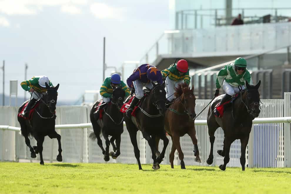 Royal Rendezvous (right) holds off Easy Game in the Galway Plate (Niall Carson/PA)