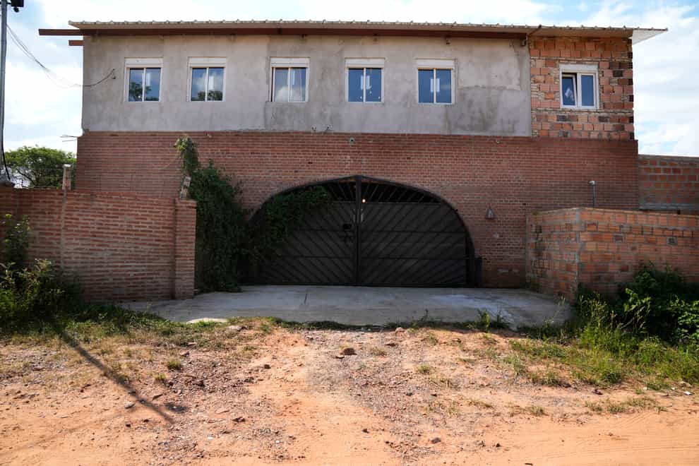Two bodies were found in the house in Paraguay (Jorge Saenz/AP)