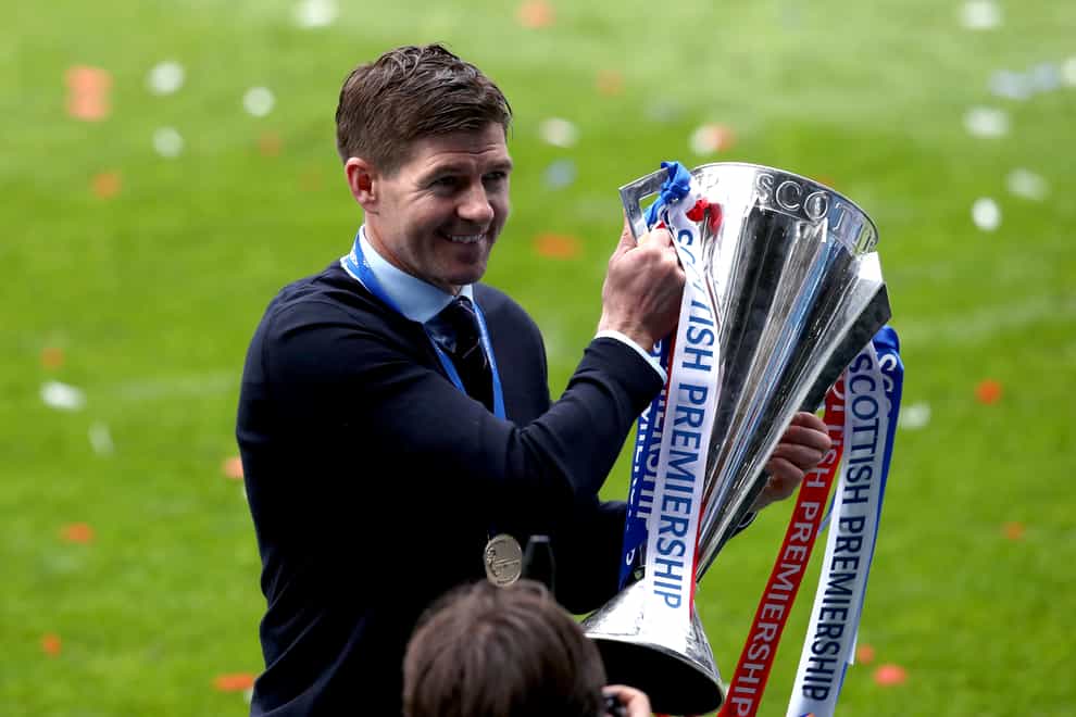 Steven Gerrard delivered the Premiership trophy to Ibrox (Andrew Milligan/PA)