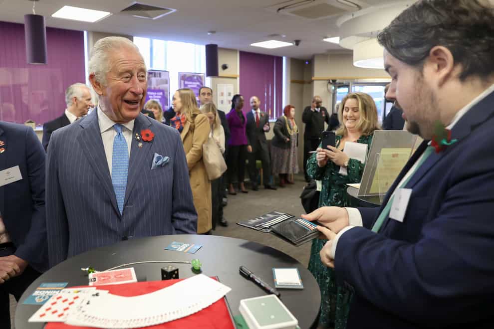 The Prince of Wales meets magician Chris Wall during a visit to meet Prince’s Trust Young Entrepreneurs (Chris Jackson/PA)