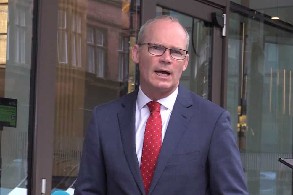 Irish Foreign Affairs Minister Simon Coveney speaking to the media outside Grand Central Hotel in Belfast. Picture date: Friday September 17, 2021.