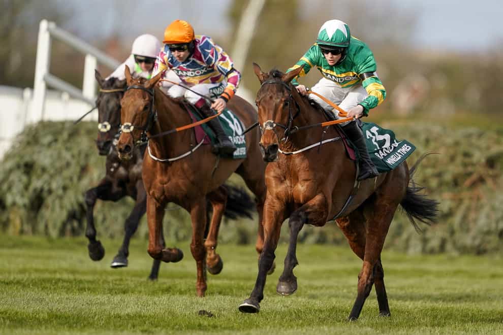 Balko Des Flos (orange cap) pushed stablemate Minella Times all the way at Aintree (Alan Crowhurst/PA)