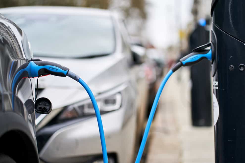 Electric car charging (John Walton/PA)