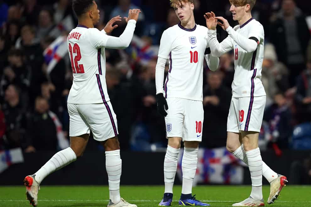 England Under-21s celebrate Anthony Gordon’s opener (Martin Rickett/PA)