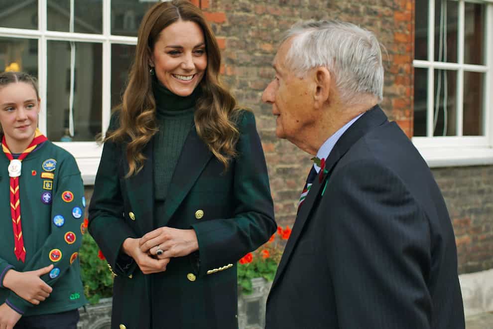 The Duchess of Cambridge in conversation with Colonel David Blum OBE,and ten-year old Cub Scout Emily Edge (Kensington Palace/PA)