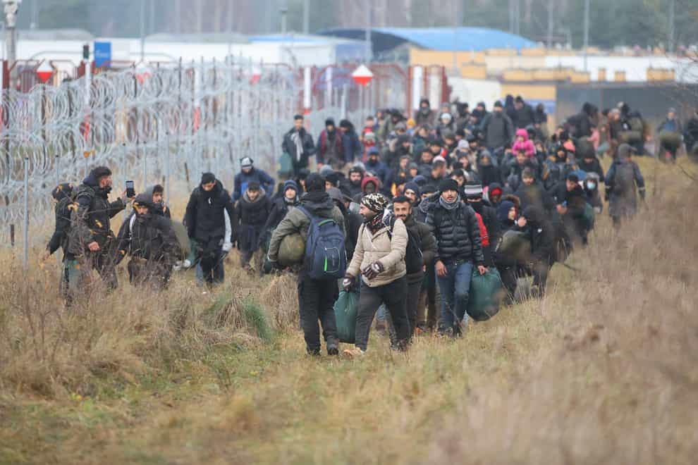 Migrants have been gathering at the Belarus-Poland border (Leonid Shcheglov/BelTA pool photo/AP)