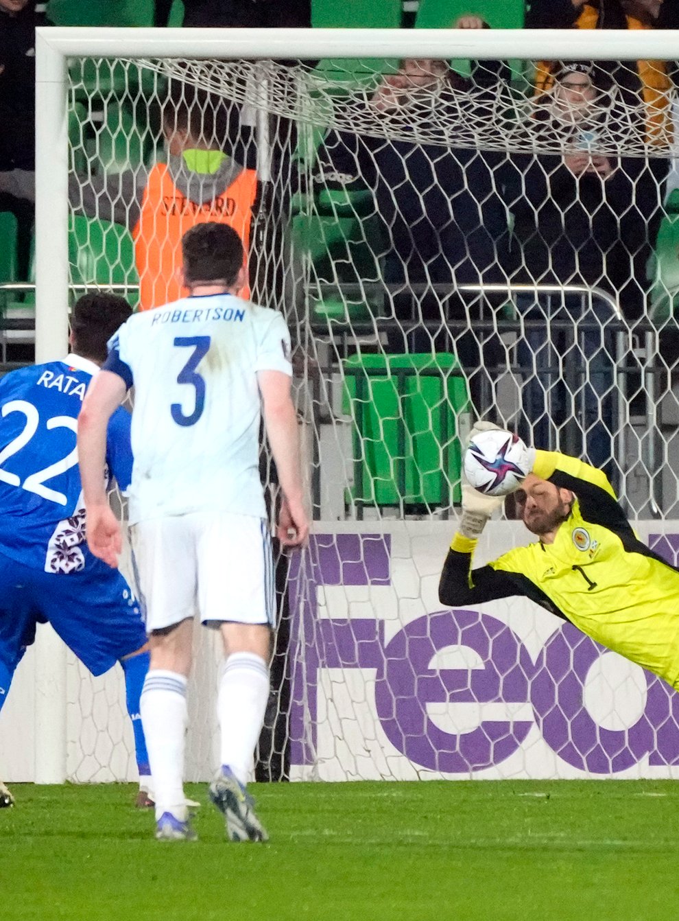 Craig Gordon saves a penalty in Moldova (Sergei Grits/AP)