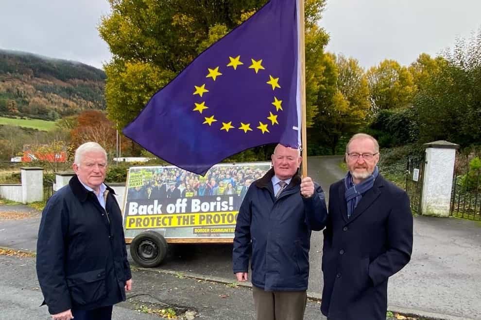 Left to right, Declan Fearon, Seamus McDonnell and Bernard Boyle of the group Border Communities Against Brexit (Border Communities Against Brexit/PA)