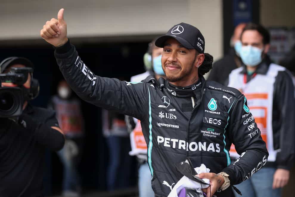 Lewis Hamilton is not giving up on his Formula One title tilt (Lars Baron/AP)