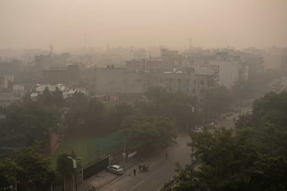 Morning haze and smog envelops the skyline in New Delhi, India (Altaf Qadri/AP)