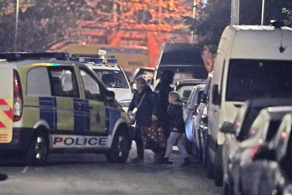 Armed police evacuate local residents during an incident an address in Rutland Avenue in Sefton Park after an explosion at Liverpool Women’s Hospital killed one person and injured another (Peter Byrne/PA)