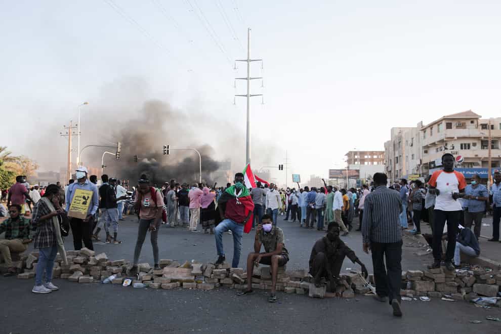 People protest in Khartoum, Sudan (Marwan Ali/AP)