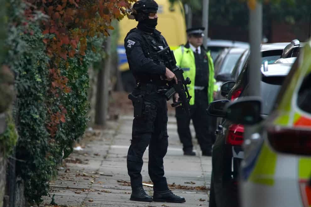 Armed police at an address in Liverpool (Peter Byrne/PA)