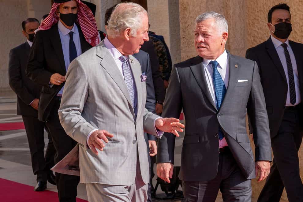 The Prince of Wales (left) is welcomed by King Abdullah II (Arthur Edwards/The Sun/PA)