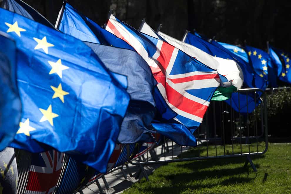 Union and European Union flags outside the Houses of Parliament (Jonathan Brady/PA)
