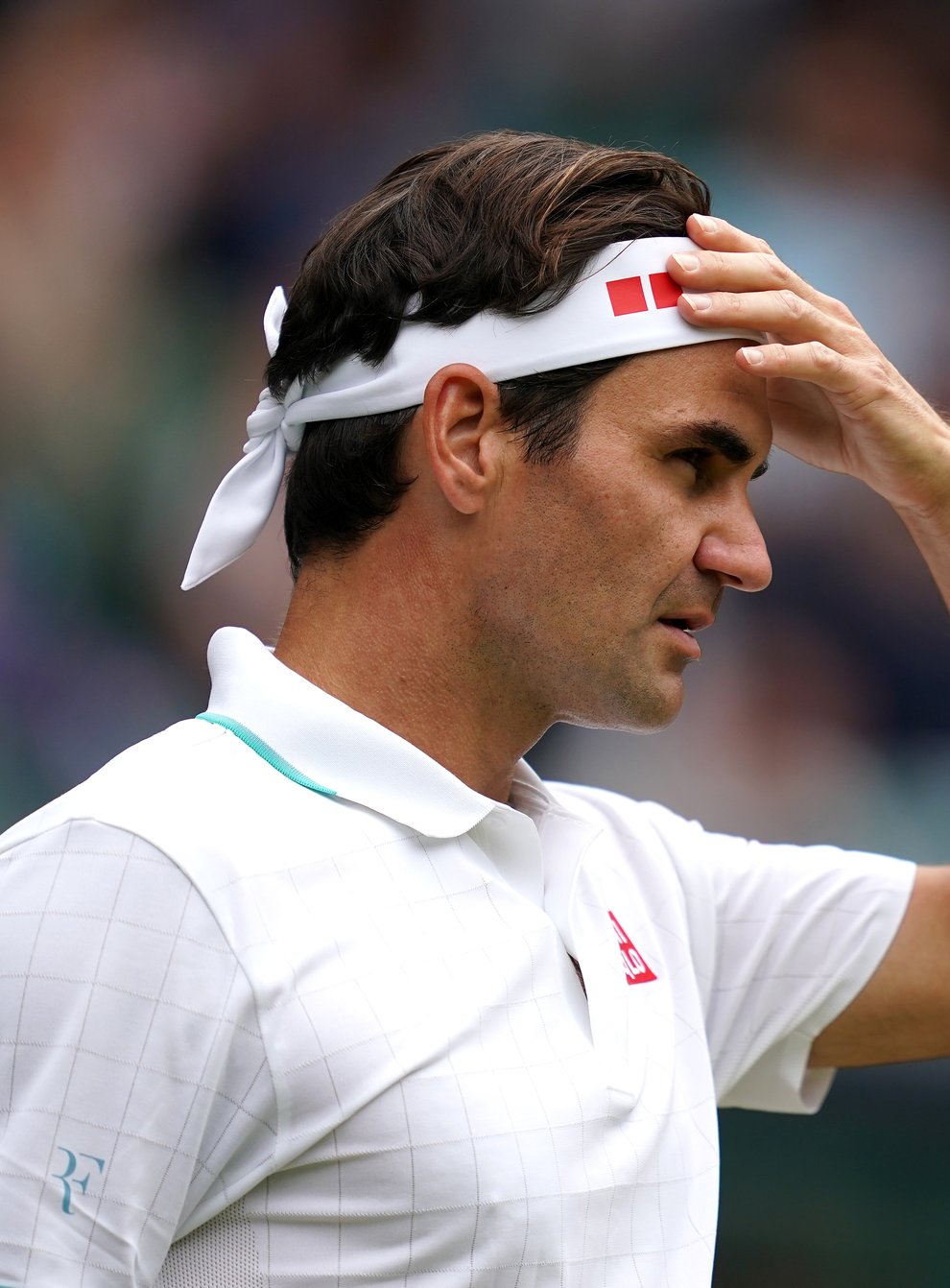 Roger Federer says he is “extremely unlikely” to be fit for next year’s Wimbledon (John Walton/PA)