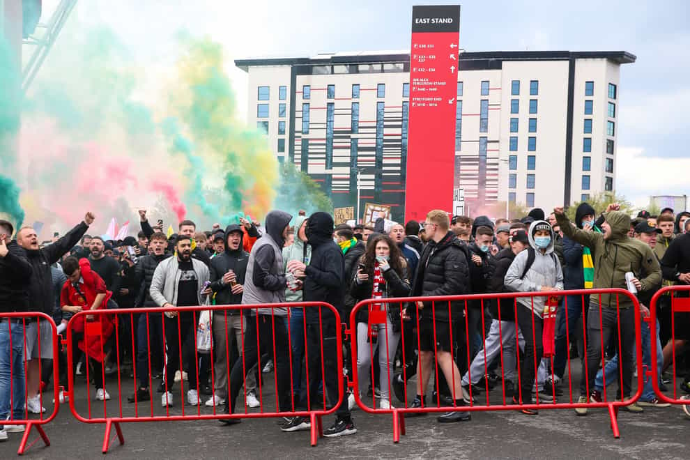 A protest outside Old Trafford turned violent in May (Barrington Coombs/PA)