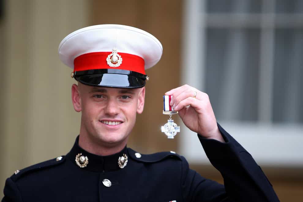 Royal Marine Commando Sergeant Major John Thompson after receiving the Conspicuous Gallantry Cross from the Queen at Buckingham Palace in 2007 (Steve Parsons/PA Wire)