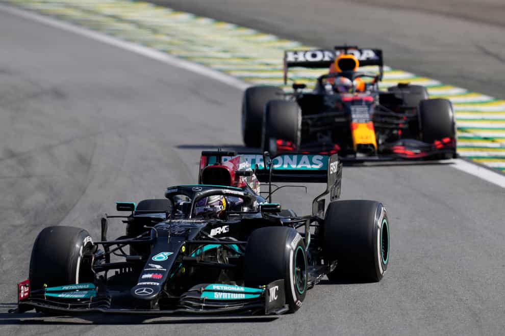 Lewis Hamilton, front, was able to pass Max Verstappen later in the race after they clashed at Interlagos (Andre Penner/AP)