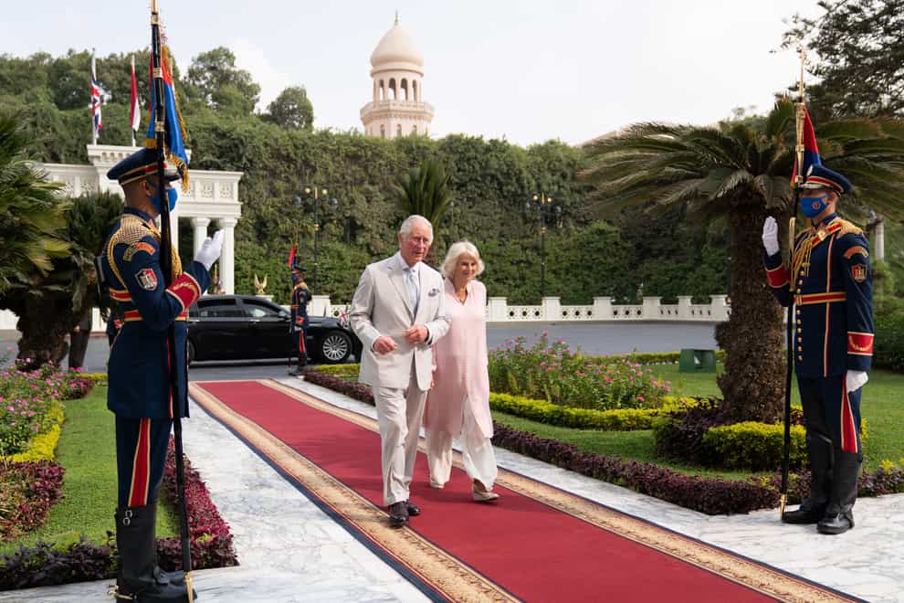 The Prince of Wales and the Duchess of Cornwall arrive at the Al-Ittahadiya Palace in Cairo (Joe Giddens/PA)