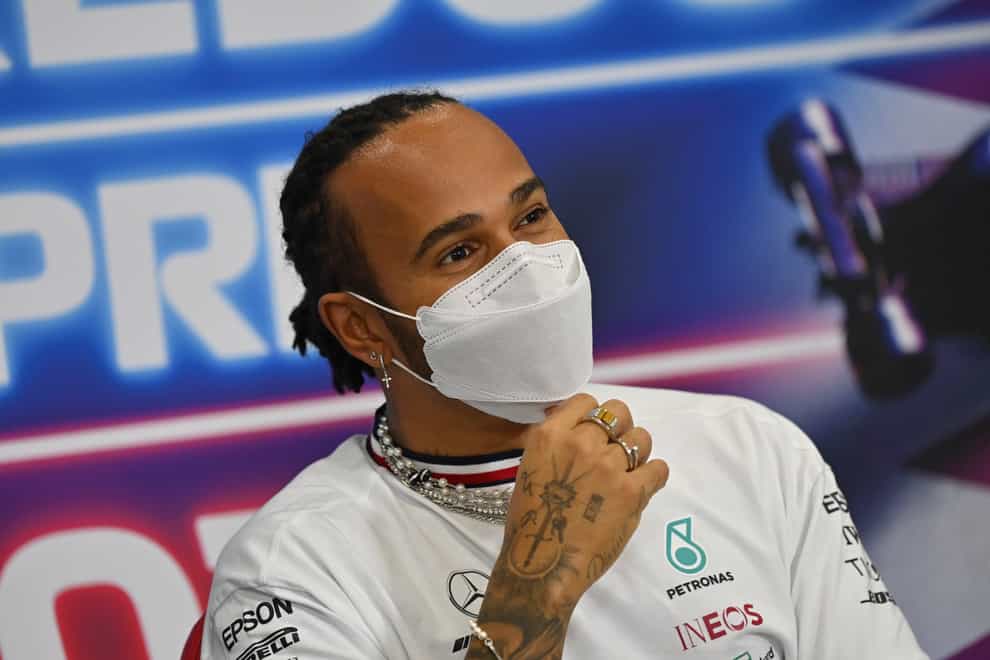 Lewis Hamilton wants more sportspeople to talk up against human rights issues. (Andej Isakovic/AP)