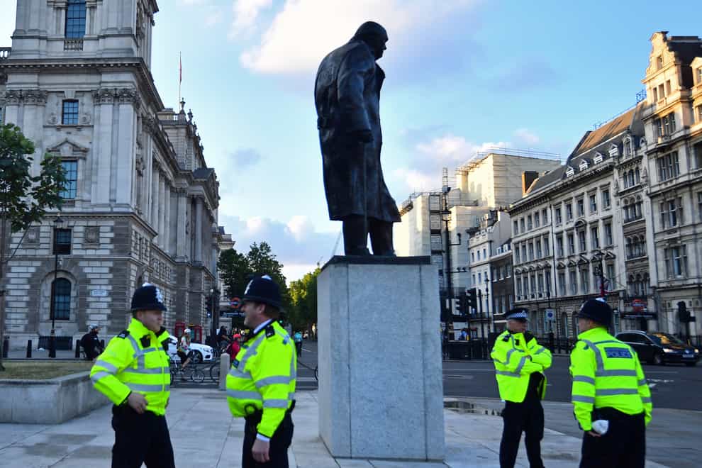 Police presence at the Winston Churchill statue on Parliament Square, London (PA)