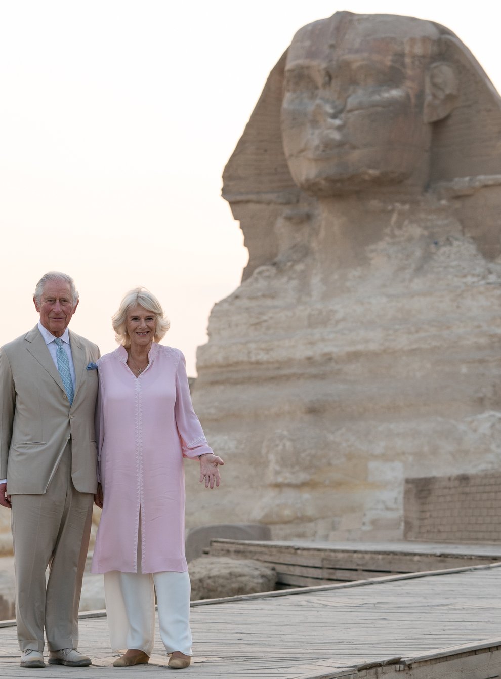 The Prince of Wales and The Duchess of Cornwall pose in front of the Sphinx during their visit to Egypt (Joe Giddens/PA)