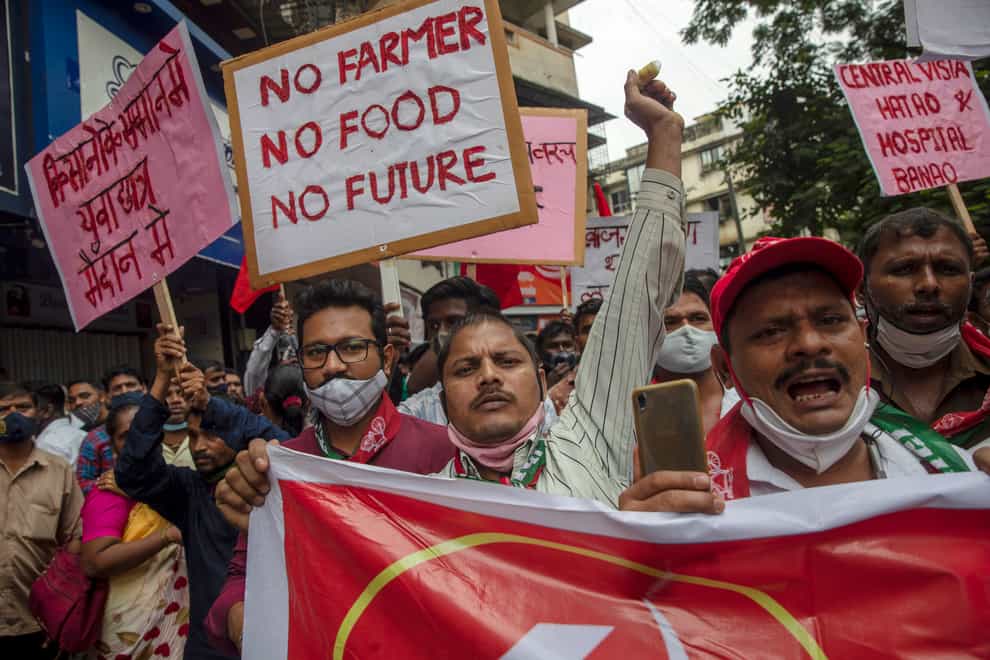 Members of the Communist Party of India during a protest against farm laws in Mumbai in September (Rafiq Maqbool/AP)