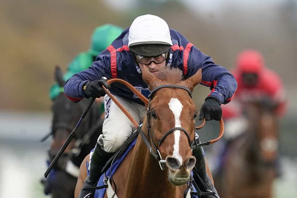 Nico de Boinville and Song For Someone clear the last to win at Ascot (Alan Crowhurst/PA)