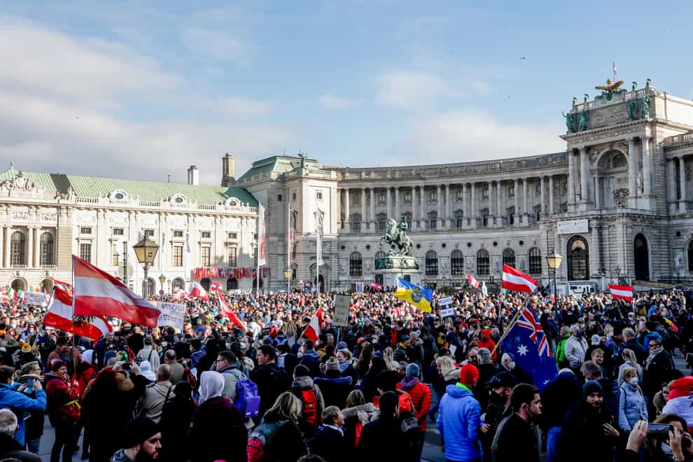 People demonstrate in Vienna (Lisa Leutner/AP)