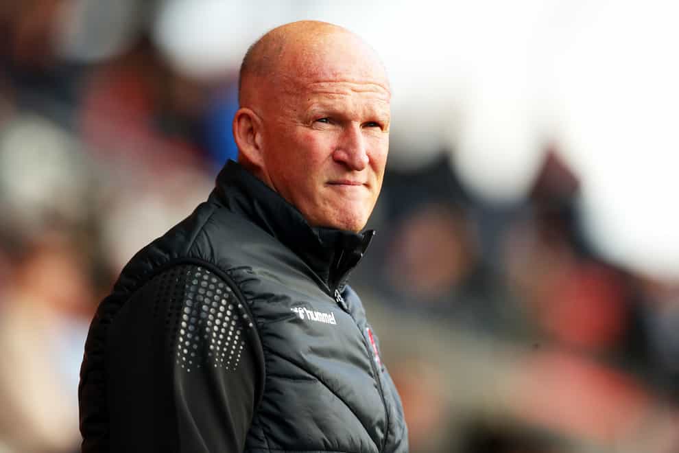 Simon Grayson’s Fleetwood suffered late agony against Morecambe (Tim Markland/PA)