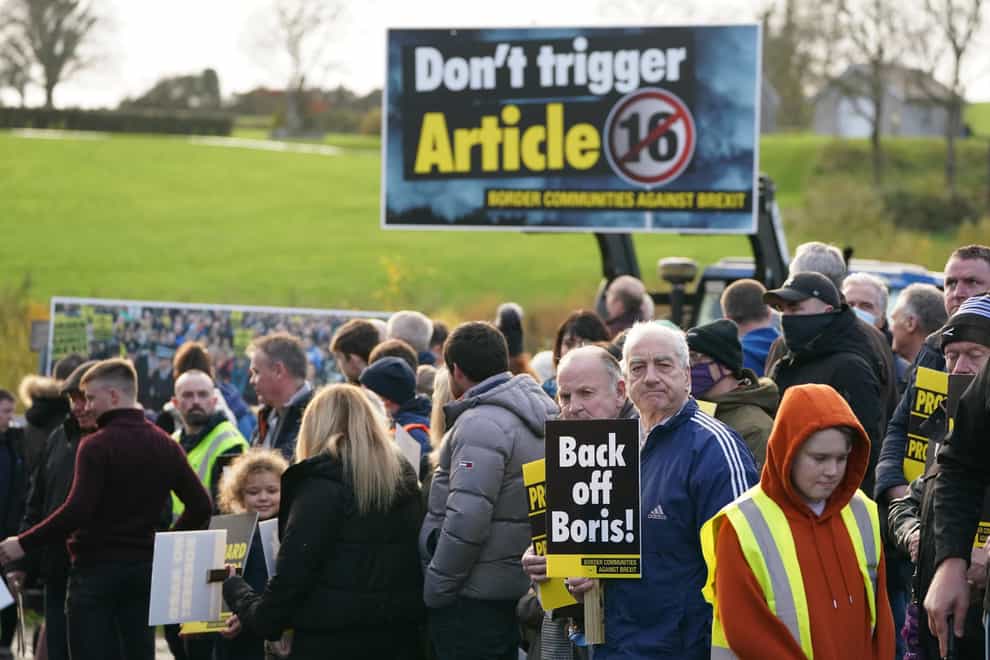 Protesters from Border Communities Against Brexit demonstrate at Flurrybridge in Carrickcarnon, on the border between the Republic of Ireland and Northern Ireland (Brian Lawless/PA)