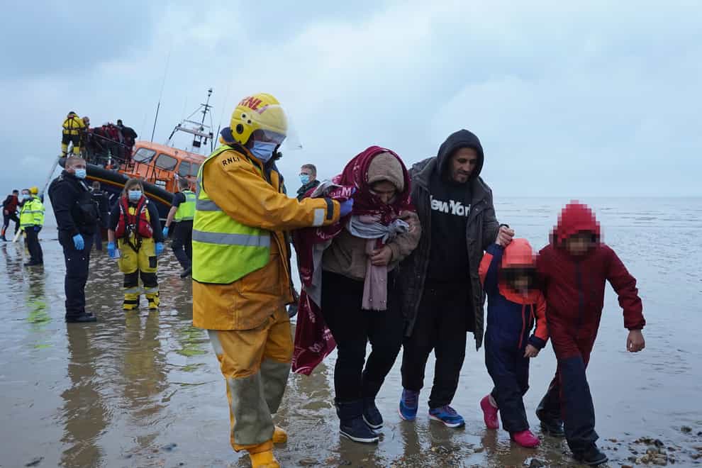 Children are among those to arrive on British shores after making the dangerous Channel crossing (Gareth Fuller/PA)