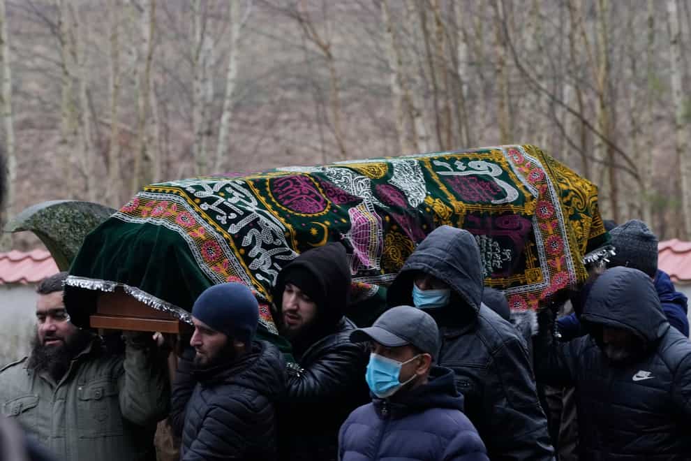 A Yemeni migrant who died in an area of forests along the Poland/Belarus border is buried in a Muslim cemetery in Bohoniki in Poland (Czarek Sokolowski/AP)