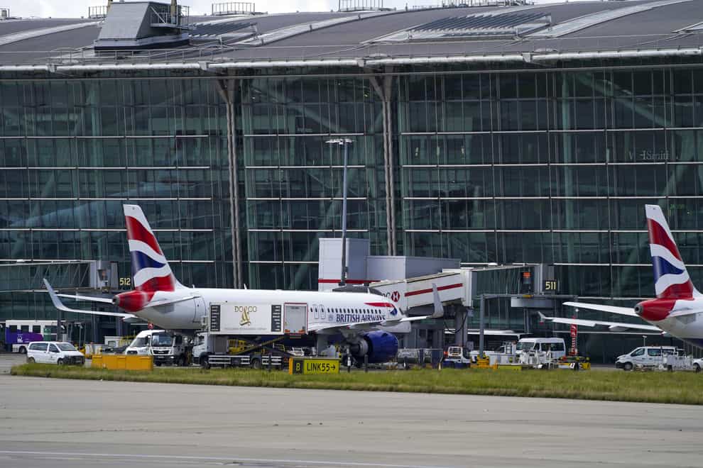 British Airways will consider cutting Heathrow flights if proposed increases in charges are implemented, the boss of the airline’s parent company has said (Steve Parsons/PA)