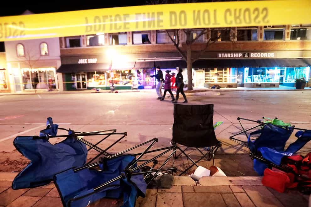 Toppled chairs after an SUV drove into a Christmas parade in Waukesha (John Hart/Wisconsin State Journal via AP)