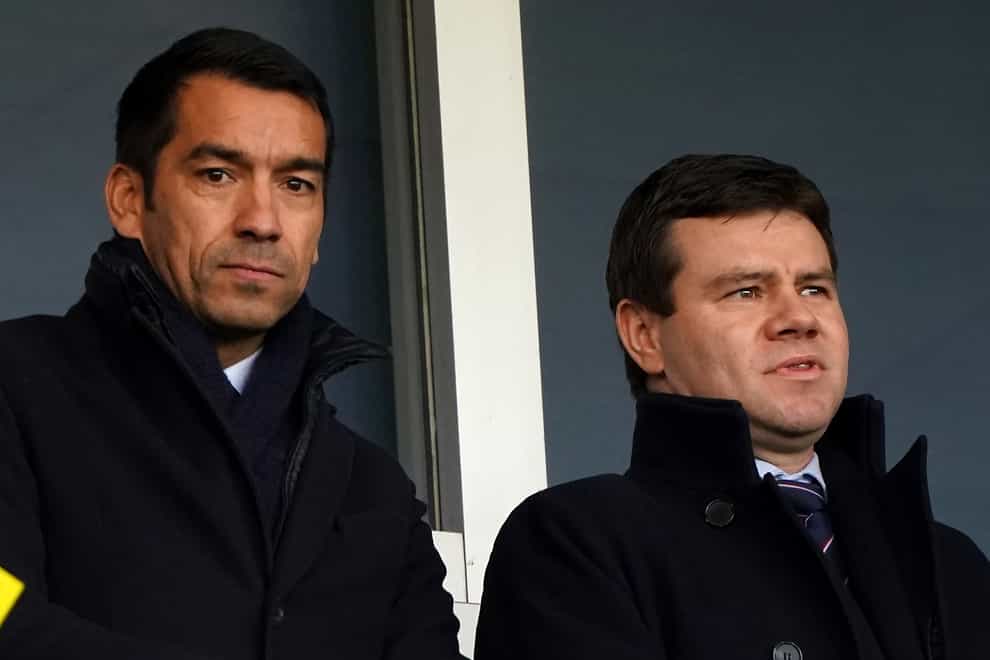 Giovanni Van Bronckhorst, left, watched his Rangers side lose to Hibernian on Sunday (Andrew Milligan/PA)