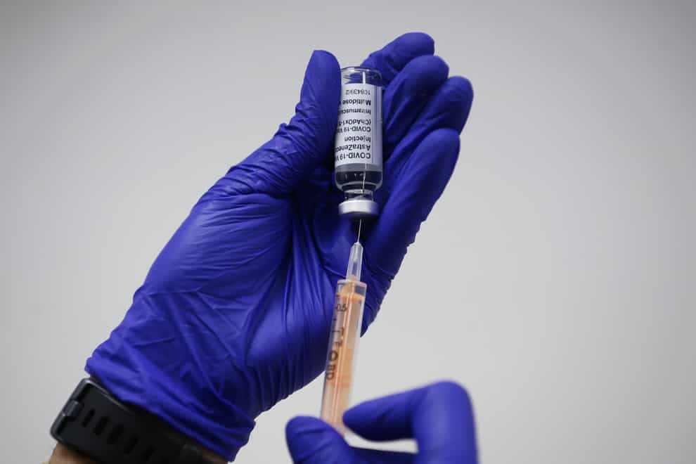 A dose of the Oxford/AstraZeneca coronavirus vaccine is prepared (PA)