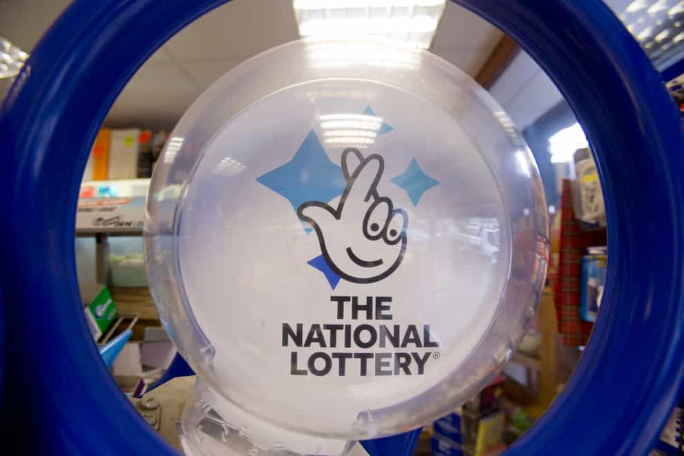 A National Lottery kiosk in a newsagent in north London (Yui Mok/PA)