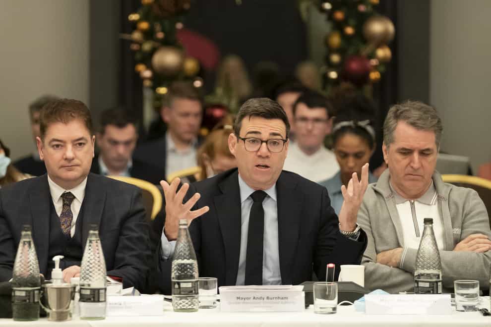 Greater Manchester Mayor Andy Burnham, centre, outlined proposals for land value capture (Danny Lawson/PA)