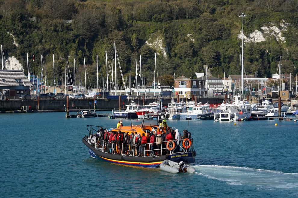 A group of people thought to be migrants are brought into Dover, Kent, onboard the Dungeness Lifeboat following a small boat incident in the Channel (Gareth Fuller/PA)