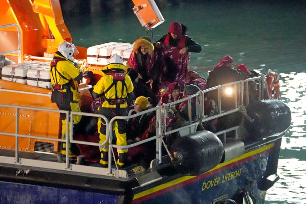 A group of people thought to be migrants are brought in to Dover, Kent, by the RNLI (Gareth Fuller/PA)