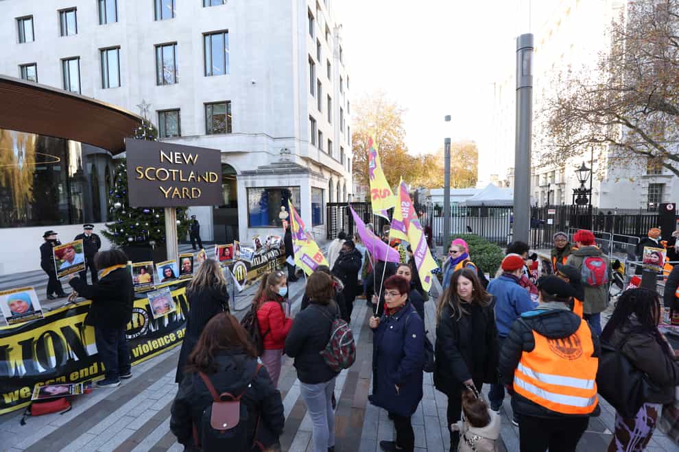 Dozens gathered outside Scotland Yard for the event (James Manning/PA)