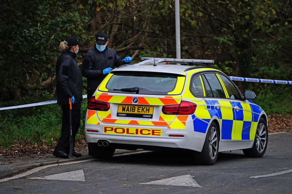 Police at the scene on Thurlestone Walk in Plymouth after a body was found (Ben Birchall/PA)