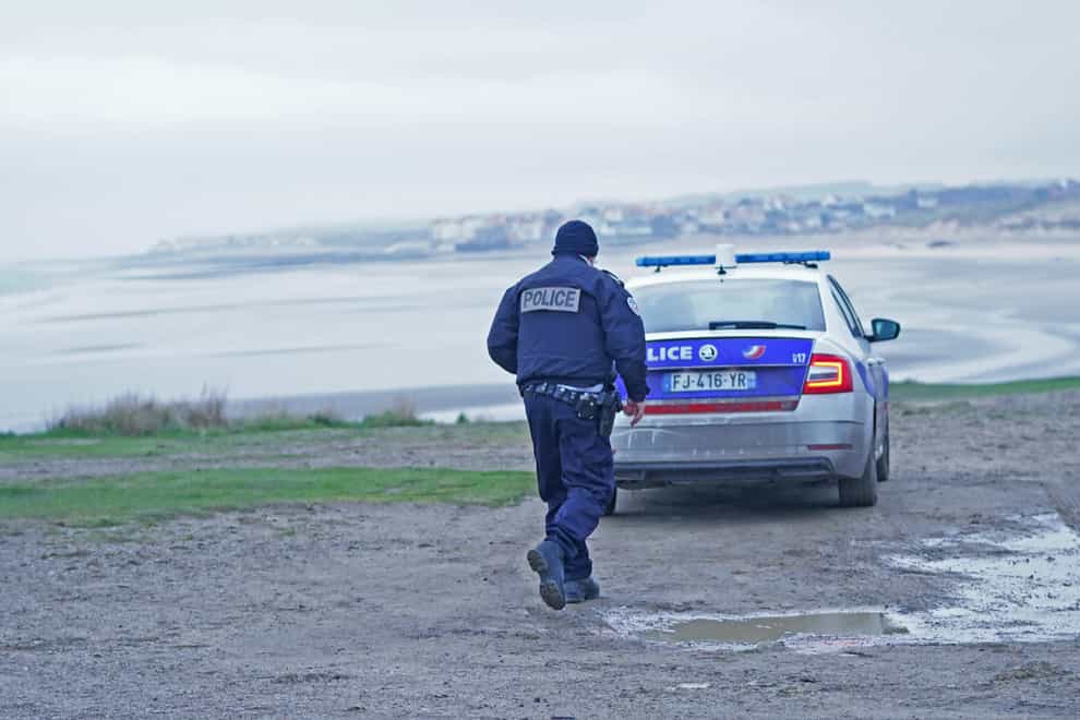 French police on the coast north of Boulogne in northern France at a stretch of beach believed to be used by migrants looking to cross the Channel (PA)
