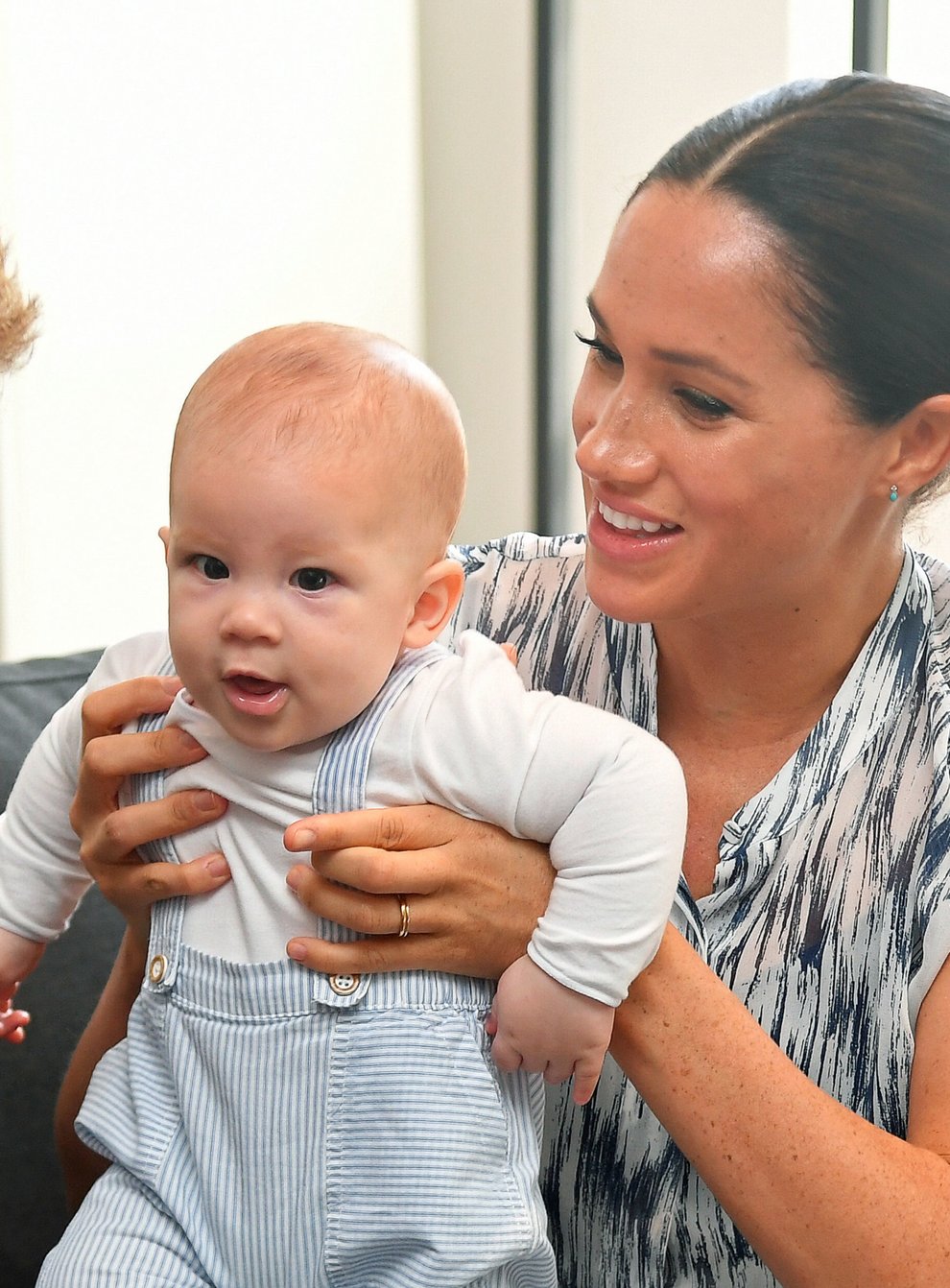 File photo dated 25/09/2019 of the Duke and Duchess of Sussex holding their son Archie during a meeting with Archbishop Desmond Tutu. The Duchess of Sussex gave birth to a 7lb 11oz daughter, Lilibet “Lili” Diana Mountbatten-Windsor, on Friday in California and both mother and child are healthy and well, Meghan’s press secretary said. (PA)